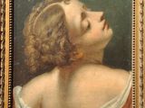 painting of a woman with her eyes closed in a gold frame