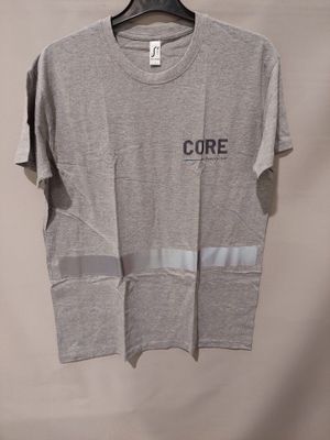 a grey t - shirt with the word core on it hanging on a hanger