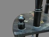 a black table with a metal object on top of it