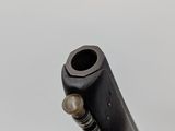 a close up of a gun on a white background