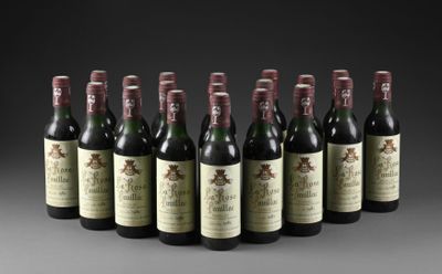 six bouteilles de vin alignées sur une table