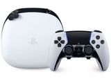 a close up of a controller and a bag on a white surface