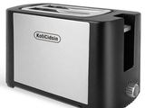 grille-pain noir et en acier inoxydable sur fond blanc