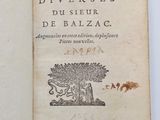 an open book with a drawing of a tree on it