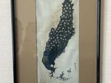 la photo d'une photo représentant un oiseau, dans un cadre