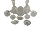 a lot of glass items that are sitting on a table
