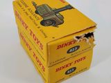 a small box that has a toy army vehicle inside of it