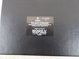 a black box with a label on it that says norev