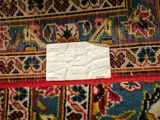 a piece of paper that is on top of a rug