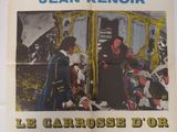 une vieille affiche de cinéma représentant un homme et une femme devant un train