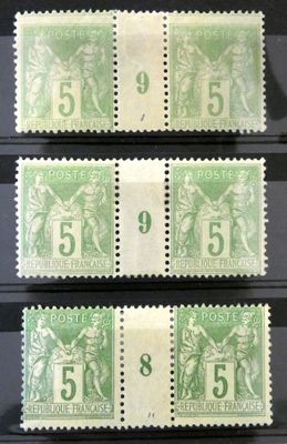 quatre timbres différents, de tailles et de couleurs variées, sur fond noir