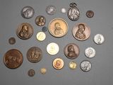 a lot of coins that are sitting on a table