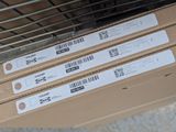 three boxes with labels are stacked on top of each other