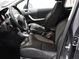 a car with a steering wheel and a seat in it