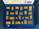 a blue case with gold coins in it on a blue surface