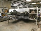 an image of a kitchen with a conveyor belt