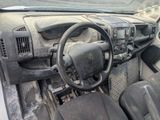 a dirty dashboard and steering wheel of a car