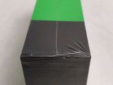 a black box with a green strip on it