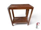 an image of a small wooden table with a shelf on it