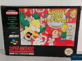 an old nintendo game box with the simpsons family fun house on it