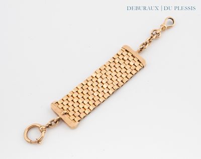 an image of a close up of a bracelet on a white surface