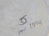 a close up of a vase with a number on it