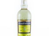 a bottle of chartrese lemon liqueur on a white background