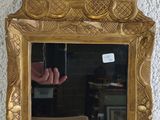 a mirror that is sitting on a table