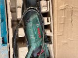 a box with a drill in it on the floor
