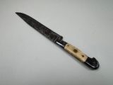 a knife that is sitting on a table