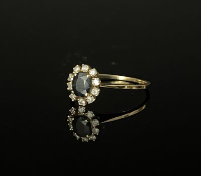 BAGUE marguerite en or jaune 750/°°° (18k), serti d'un saphi… - Photo 1