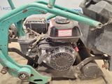 an image of a lawn mower being used to cut grass