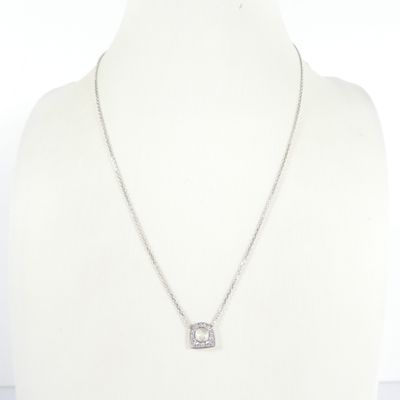 a close up of a necklace on a mannequin mannequin