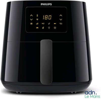 the philips air fryer is black and has a digital display