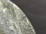 a close up of a knife that is on a table