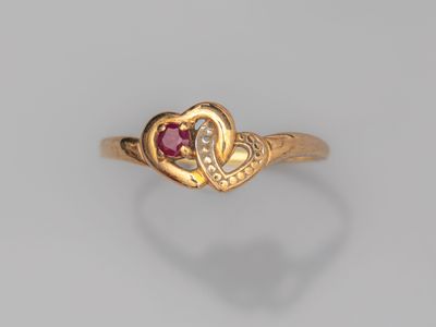 Bague en or rose 750°/°° (18K), à motif de coeurs entrelacés…