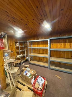 a room filled with boxes and boxes on the floor