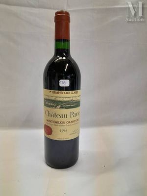 a bottle of wine that is sitting on a table