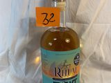 a bottle of rum in front of a white background