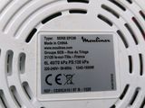 an image of a close up of the back of a white smoke detector
