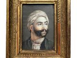 portrait of a man in a turban, in a gold frame