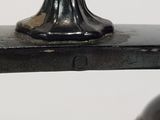 a close up of a metal object on a table