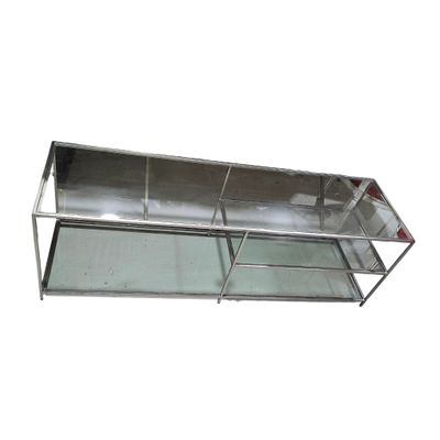 an image of a stainless steel shelf with glass shelves on it