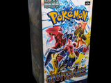 a box of pokemon card game on a black background