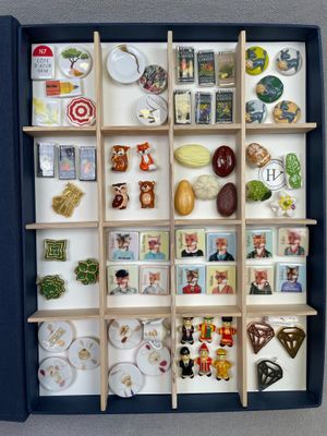 a shadow box with many different items in it