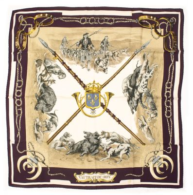 un foulard carré orné d'une image représentant un cheval et son cavalier