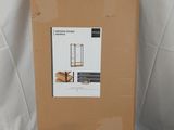 a cardboard box with a picture of a chair inside of it