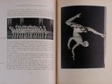 an open book with a picture of a man doing a trick