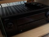 une photo d'une chaîne hi-fi dans un meuble