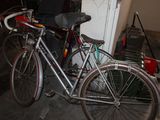 a bike that is parked next to a door